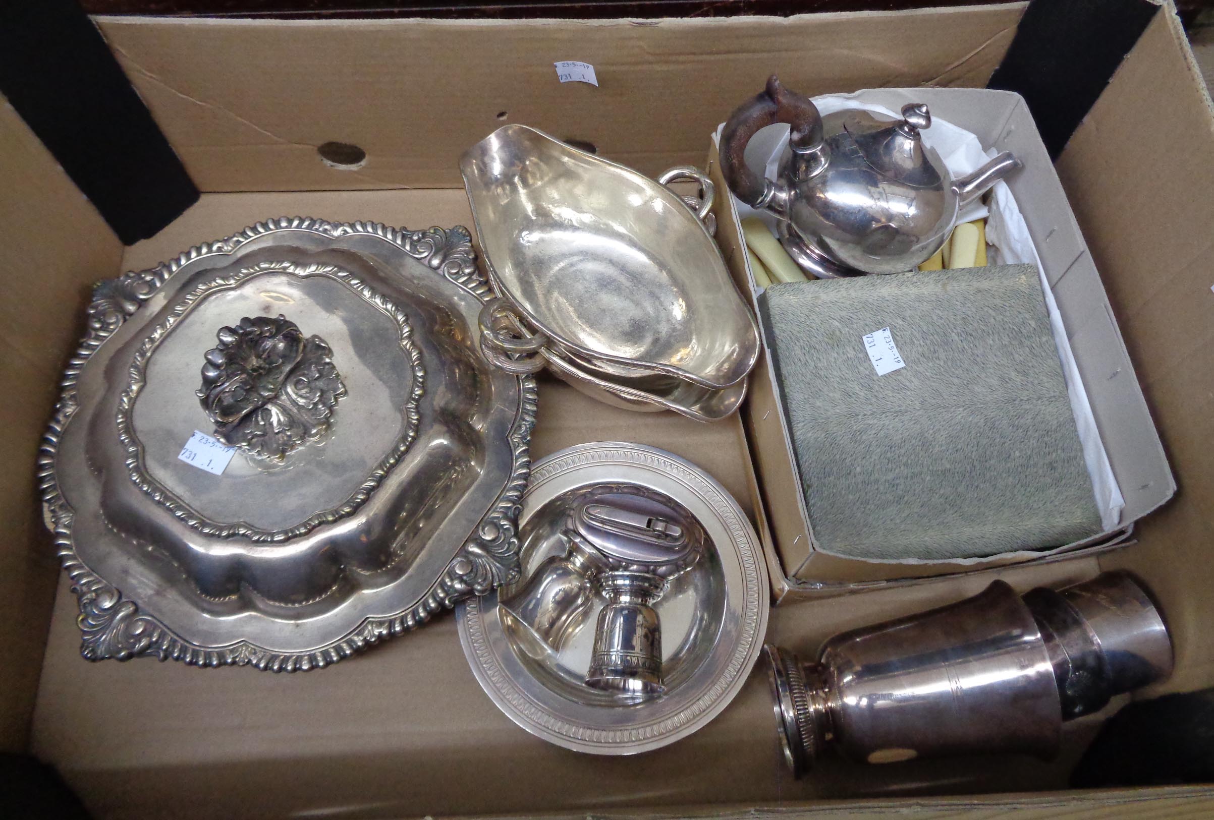 A box containing a quantity of silver plated items including ornate entrée dish, pair of gravy