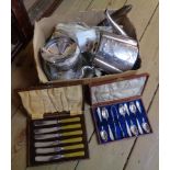 A box containing a small quantity of silver plated cased and loose cutlery - sold with another