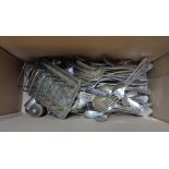A box containing a quantity of silver plated cutlery, a toast rack and condiments