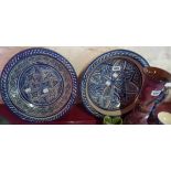 Two continental pottery chargers - sold with a blue and white ginger jar and contents