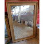 An antique gilt framed oblong wall mirror - 3' 9" X 31"