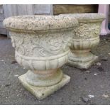 A pair of large stoneware garden urns