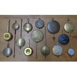 A bag of mainly mantel clock pendulums - various age and styles