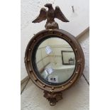 A small late Georgian style convex wall mirror