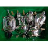 A four piece silver plated tea set - sold with three sauce boats