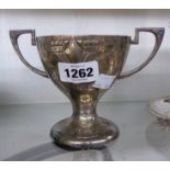 A 4 1/2" early 20th Century WMF silver plated pedestal bowl with flanking cast handles - liner