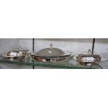 Three matching silver plated entrée dishes with covers and American glass liners