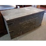 A 3' 6 1/2" early 20th Century metal bound pine transit trunk bearing name Capt. P. A. Maynard 1/5th