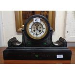 A late Victorian black slate and malachite cased mantel clock with visible anchor escapement to dial