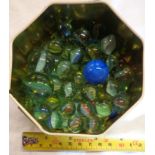 A small collection of cat's-eye marbles
