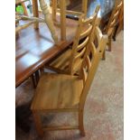A set of six modern waxed pine high ladder back kitchen chairs with solid sectional seats and square