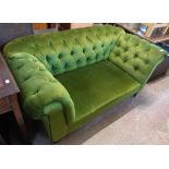 A 5' 5" early 20th Century single drop-end Chesterfield settee with green button back upholstery,
