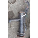 A cast iron decorative water pump