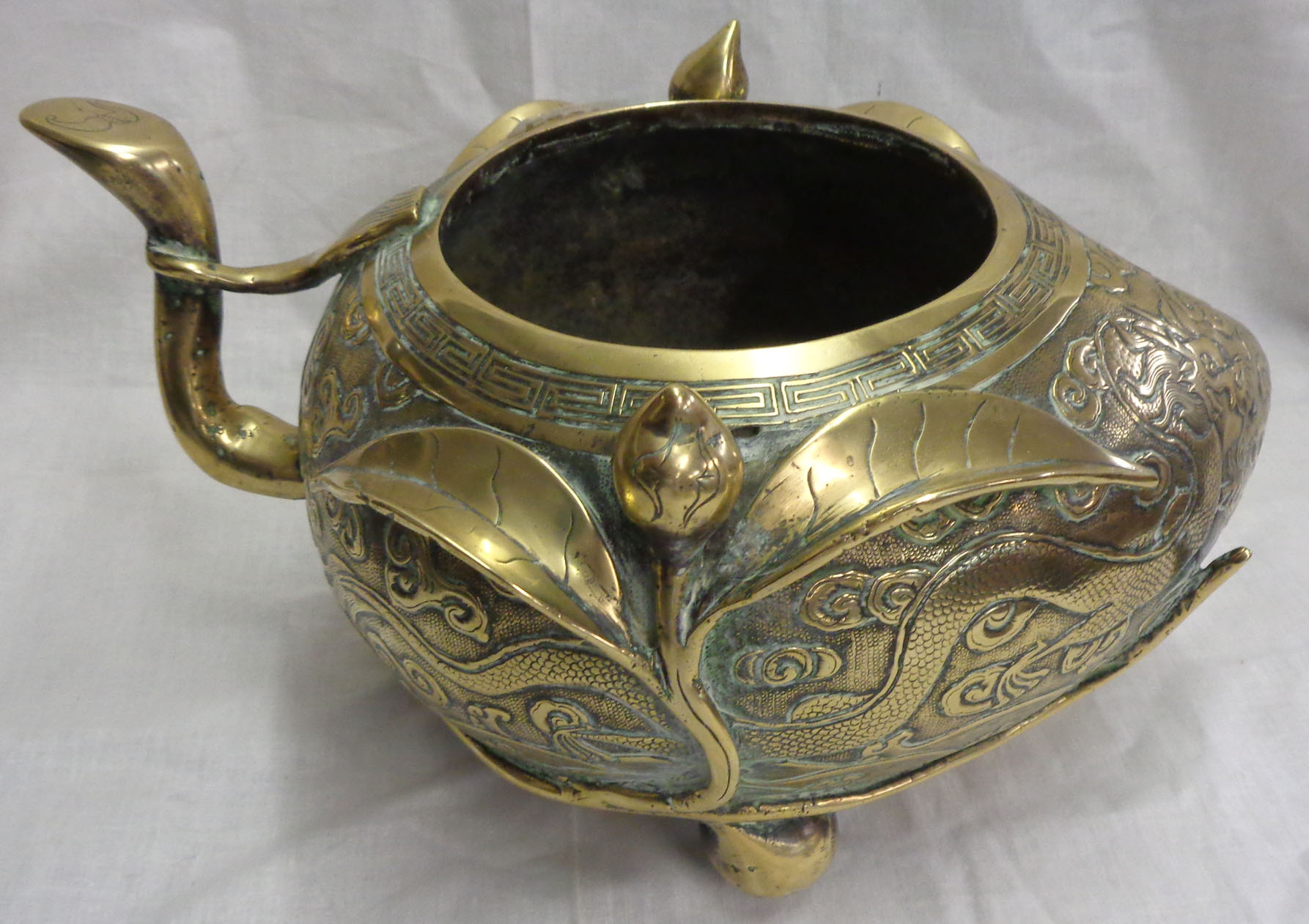 An antique Chinese bronze censer of asymmetric form with engraved air dragon and meandering - Image 6 of 13