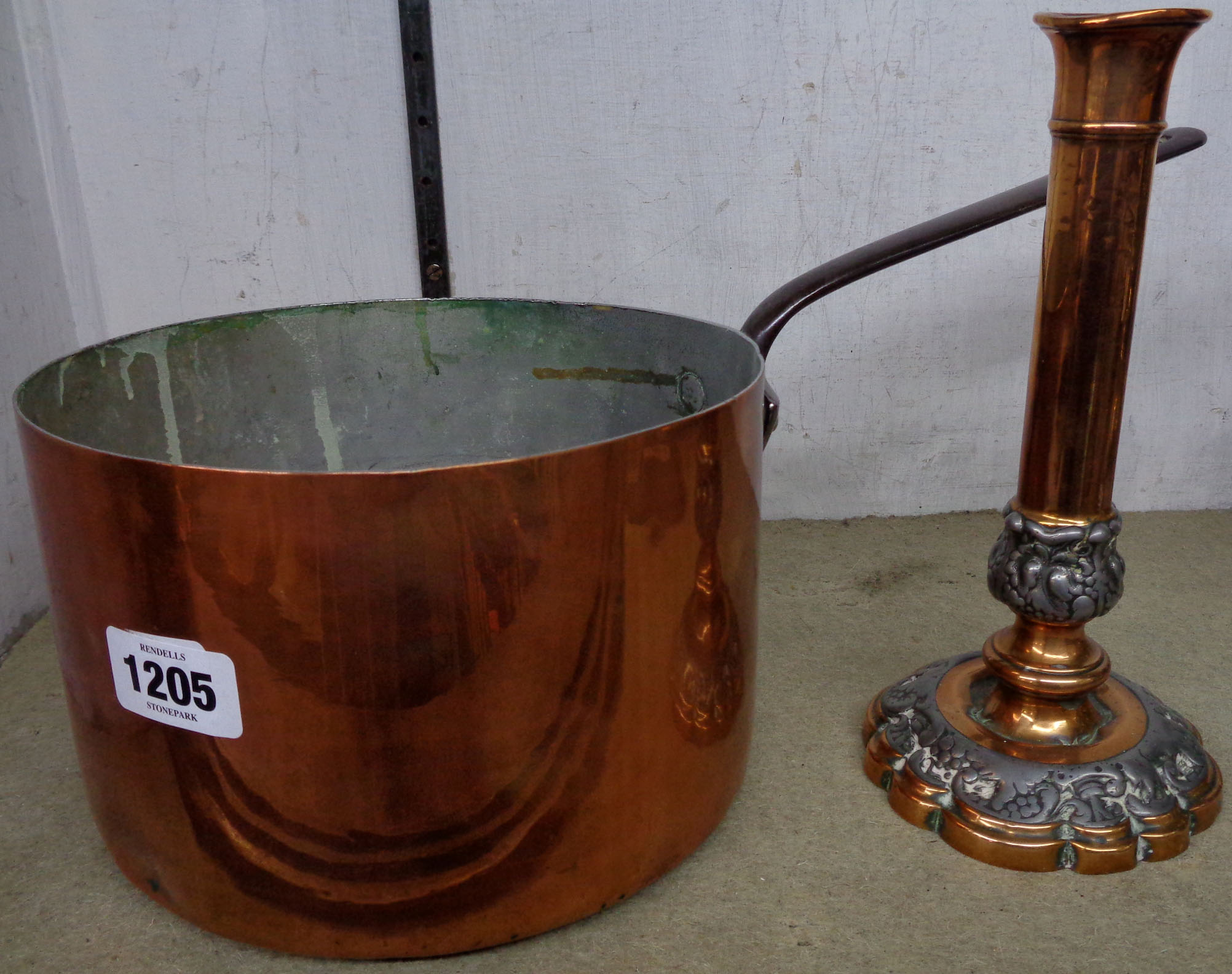 A copper saucepan - sold with a copper and pewter candlestick