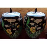 A pair of oriental ginger jars with qilin decoration - one a/f