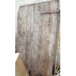 A rustic pine door