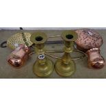 A copper chestnut roaster - sold with a brass skillet and pair of candlesticks, etc.