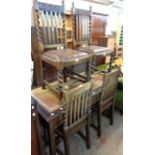 A set of four stained oak framed high lath back dining chairs with upholstered drop-in seats, set on