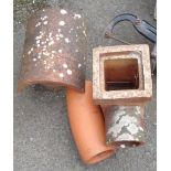 A terracotta chimney cowl, drain hopper and pipe