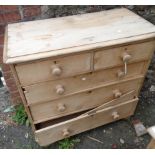 A 36" pine chest of two short and three long graduated drawers - one drawer broken