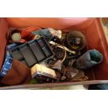 A tin trunk containing a large quantity of collectables and other items including glove puppets,