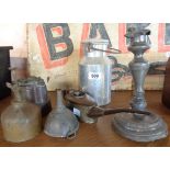 A copper jelly mould, pewter candlestick, funnel, miniature milk churn, and two oil cans