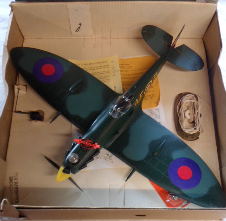 A Cox Thimble Drome engine powered model Spitfire Mk. VB in original box with instructions - one
