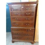 A 3' 8 1/2" 19th Century mahogany chest on chest with moulded cornice, two short and three long