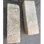 A pair of square section granite posts