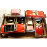 A collection of model vintage cars, Cadillacs, etc., some boxed