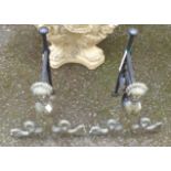 A pair of brass and cast iron melusine pattern andirons