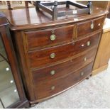 A 3' 6" Victorian mahogany bow front chest of two short and three long graduated drawers, set on