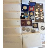 A collection of various coin sets and commemorative Crowns, etc.