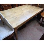 A waxed pine farmhouse kitchen table with opposing drawers, set on turned legs - 6' 6" X 3' 10"