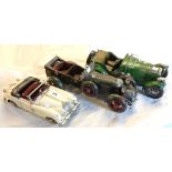 A modern tinplate model of a vintage Bentley, a similar Jaguar and another
