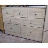 A modern Alstons Furniture bedroom suite, comprising 3' 9" triple wardrobe, seven drawer dressing