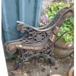 A pair of cast iron bench ends