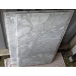 Two slabs of white marble with moulded edges