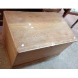 A 33" antique waxed pine lift-top box