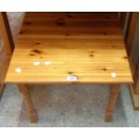 A pair of 21 1/2" modern polished pine bedside tables, set on turned legs
