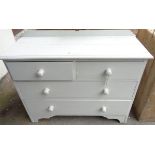 A painted chest of two short and two long drawers