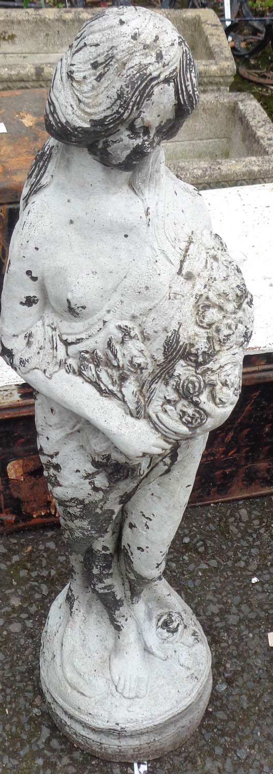 A cast concrete garden statue
