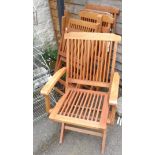 A set of five folding teak garden chairs