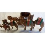 A small wooden coach and horses - sold with a carved wooden camel train (a/f)