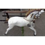 A rocking horse with safety rocker and some accessories, likely Lines Brothers - adapted and in need