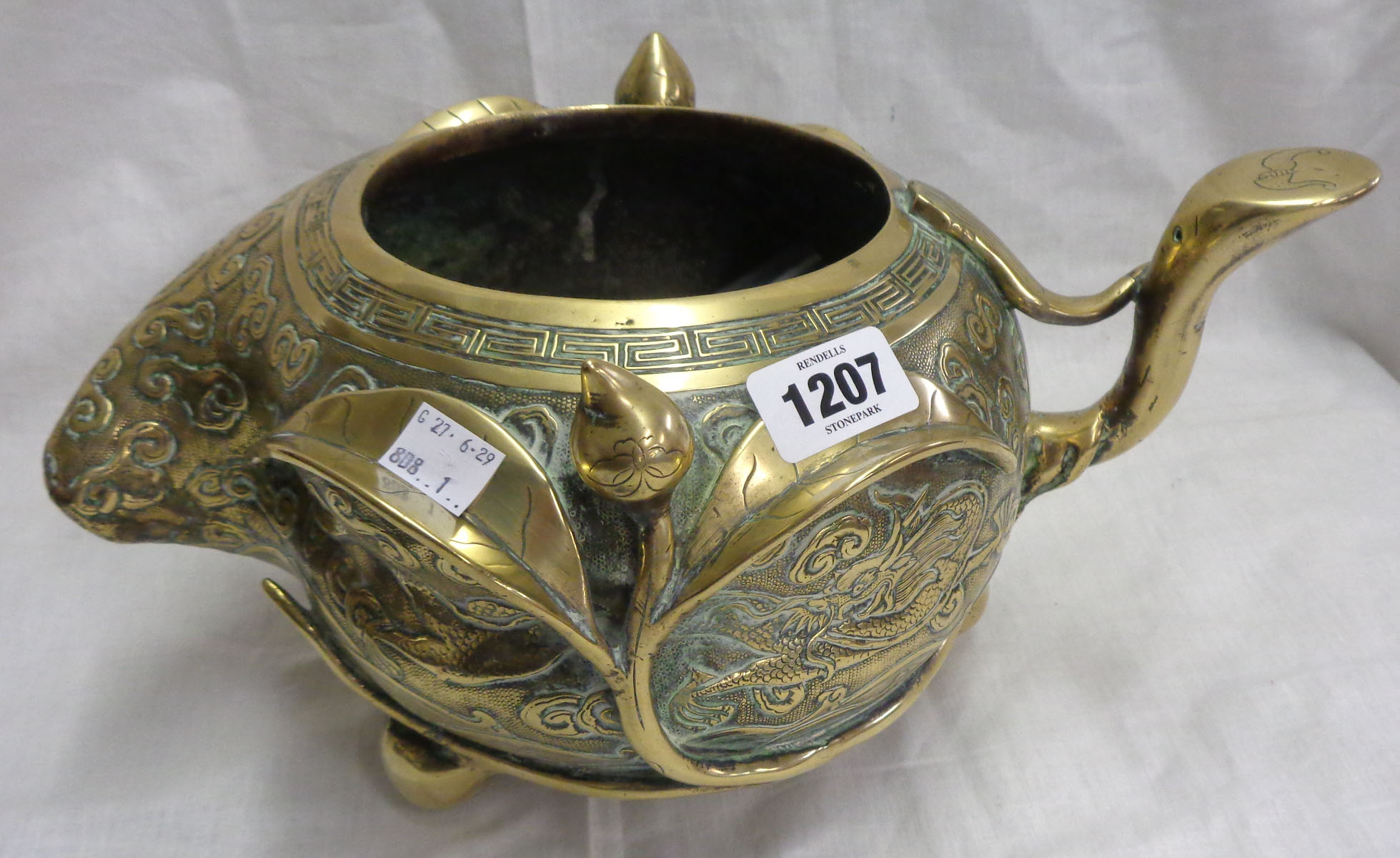 An antique Chinese bronze censer of asymmetric form with engraved air dragon and meandering - Image 5 of 13