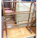 A Victorian style stained wood double towel rail