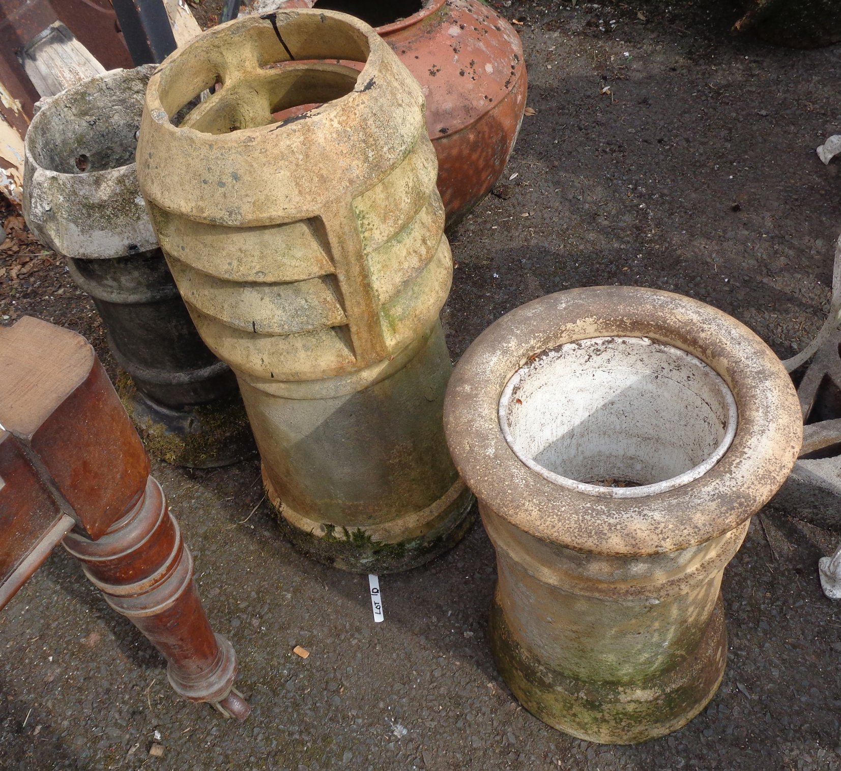 Three chimney pots of various design