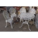 A painted aluminium patio set comprising table and set of four chairs
